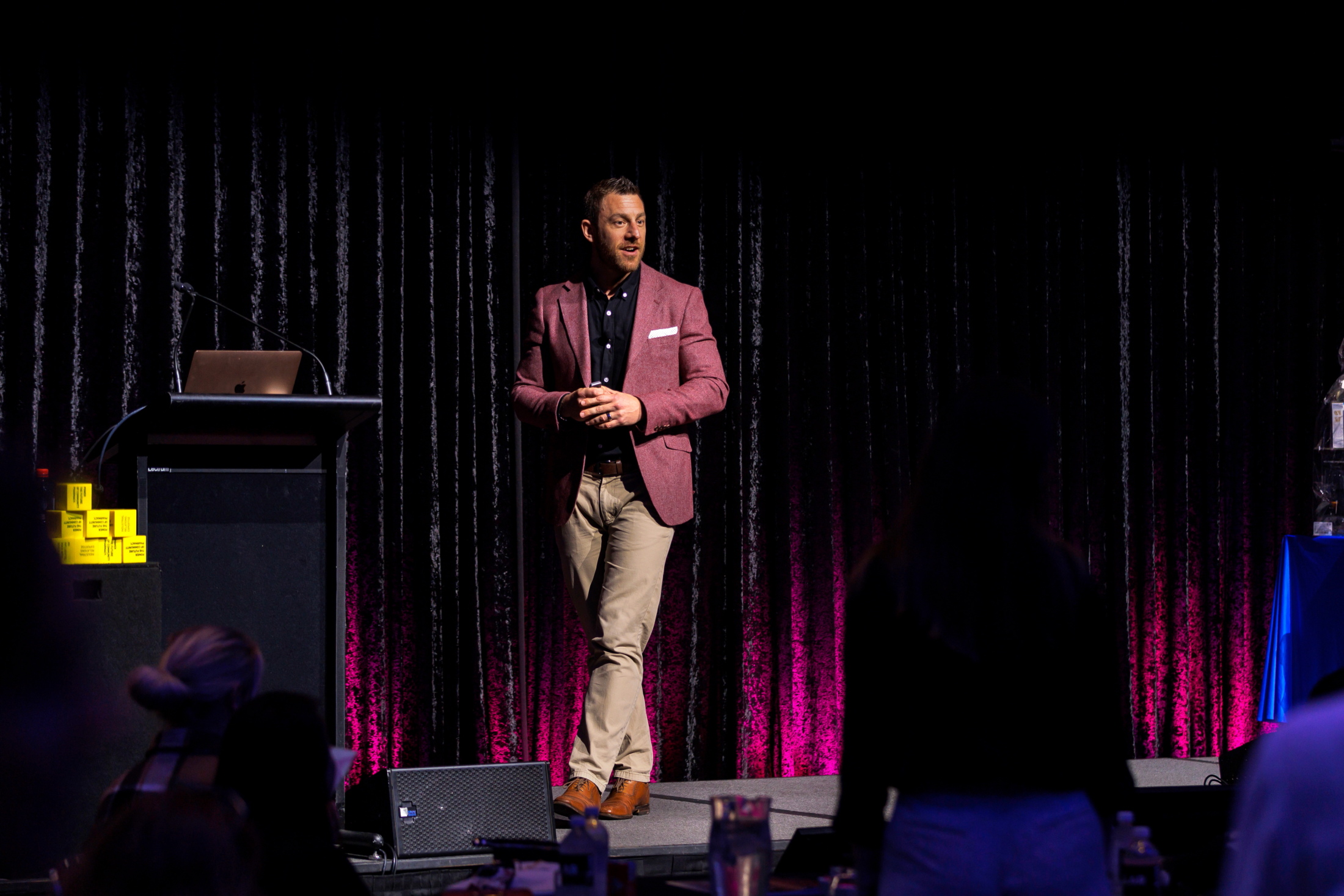Olly speaking with an audience